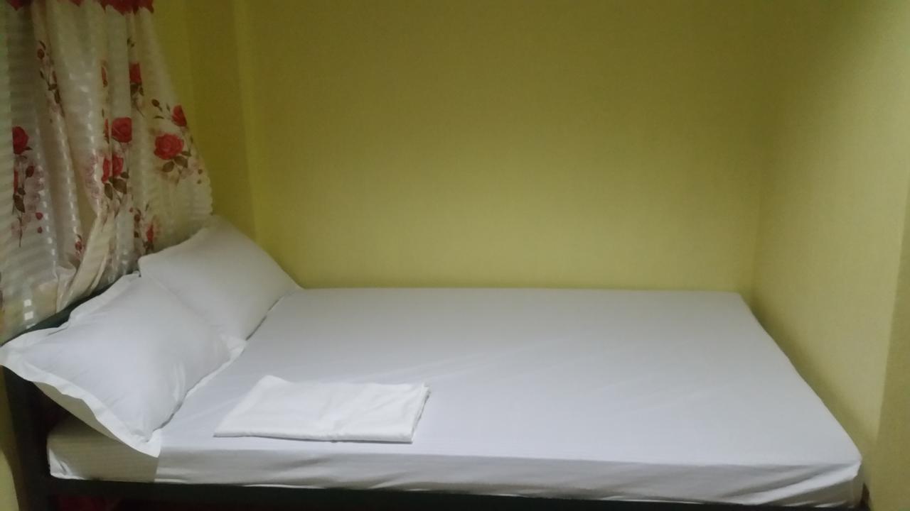 Rms Travellers Inn Poro Esterno foto